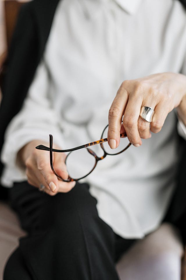 Professional wearing stylish prescription glasses at work