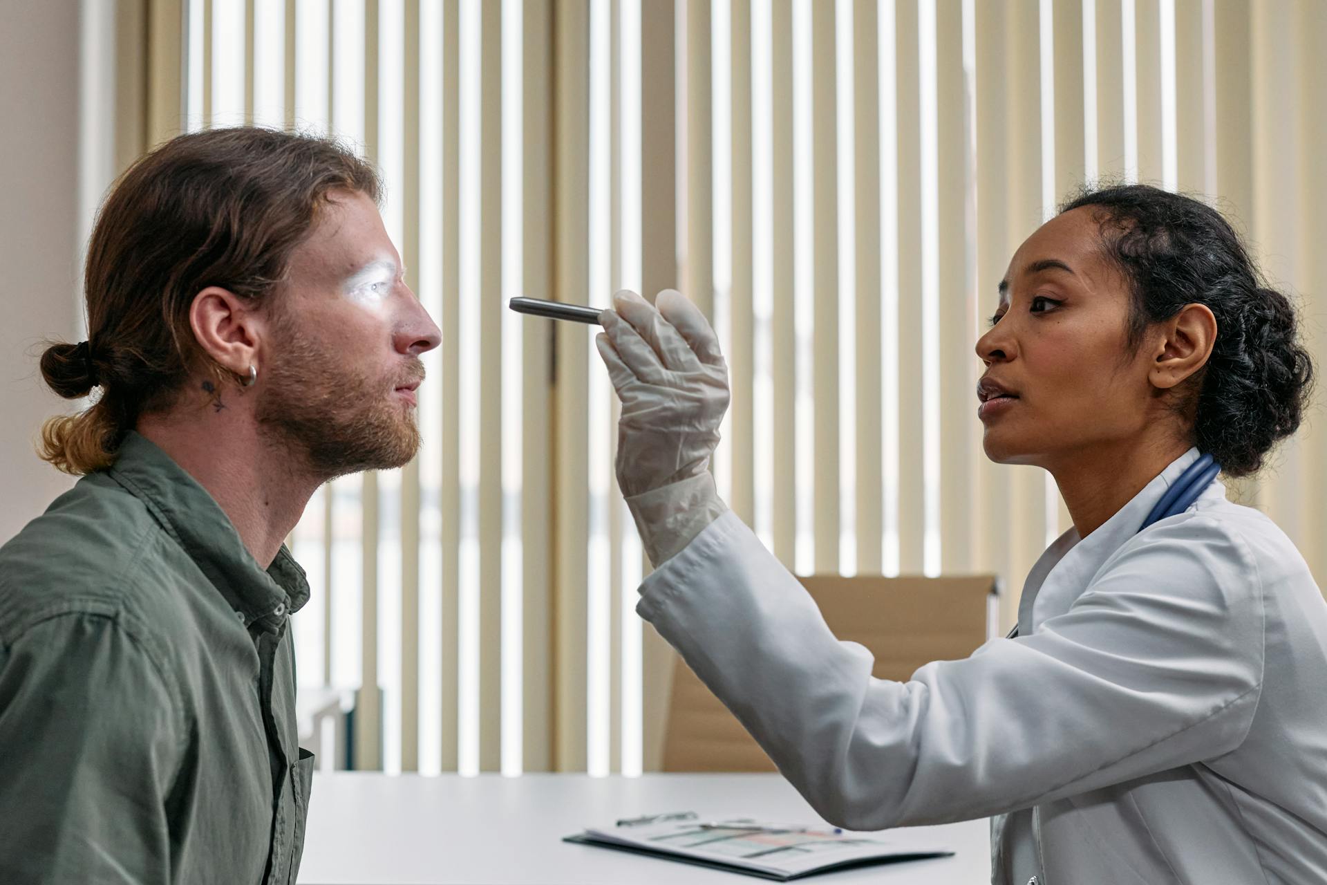 Doctor consulting with patient about eye health