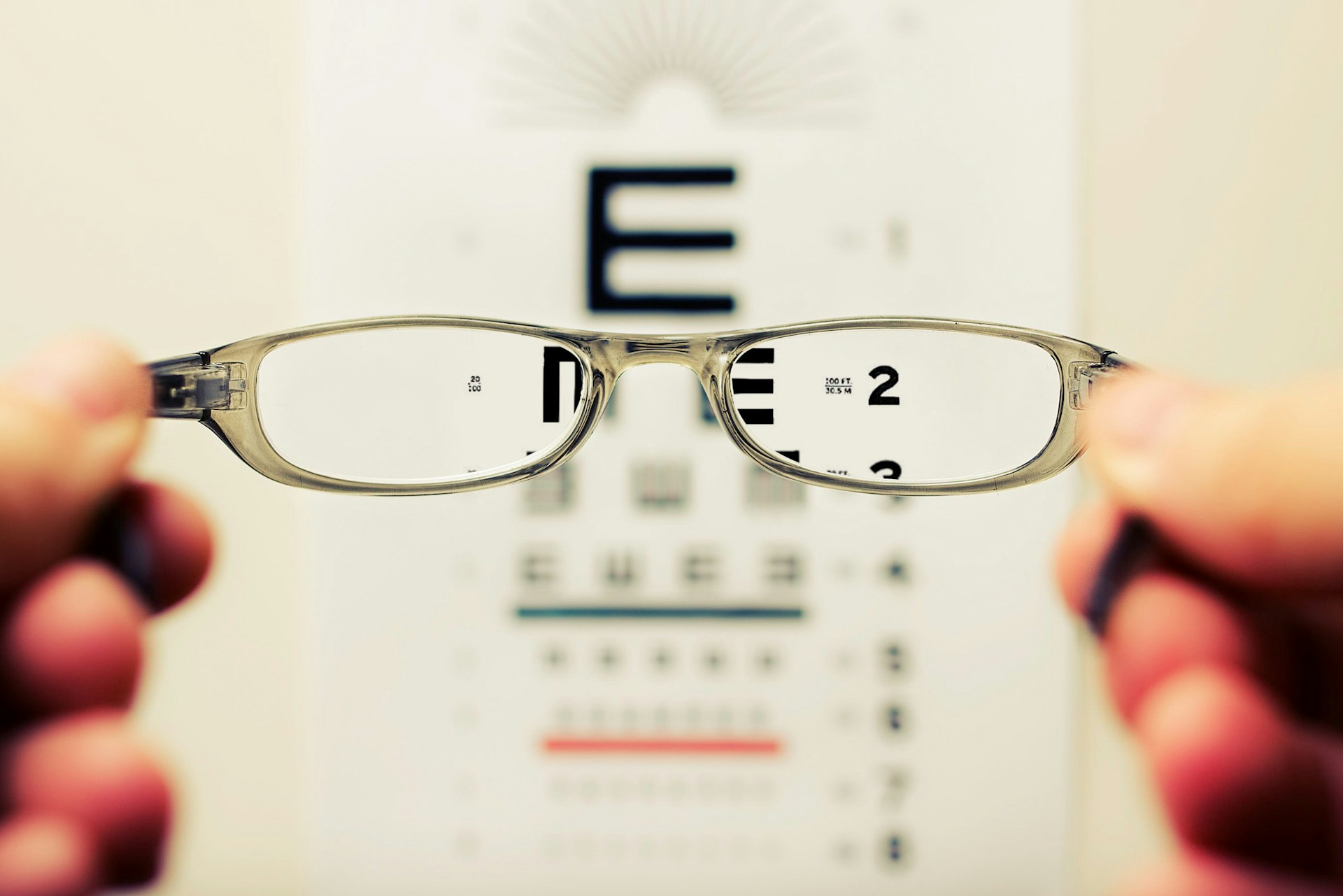 Modern eye examination room with patient and doctor